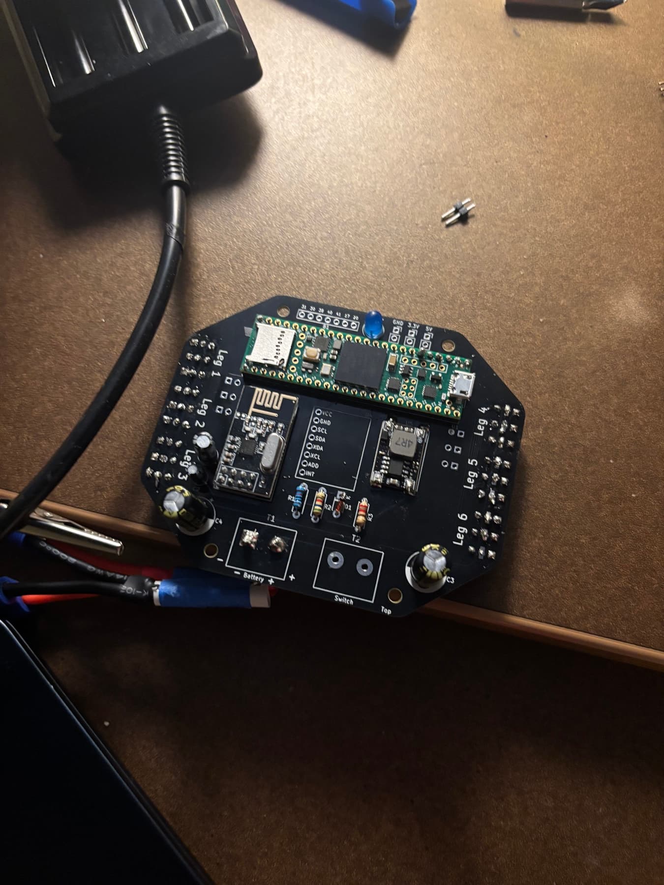 Custom robot leg controller PCB with a Teensy microcontroller and wireless module
